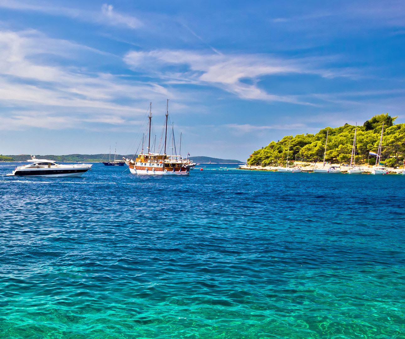 Plunge into the crystal clear waters around the emerald Pakleni Islands