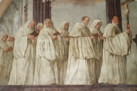 An old painting of a group of Trappist monks in white robes.
