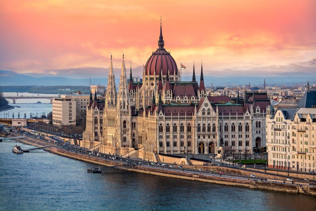The parliament building in Budapest, Hungary at sunset offers an insightful view.