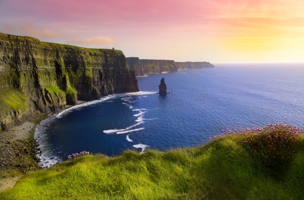 Insightful view of Cliffs of Moher in Ireland at sunset.