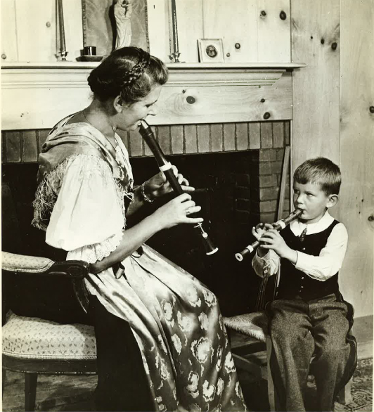 Von Trapp son and mother practicing instruments