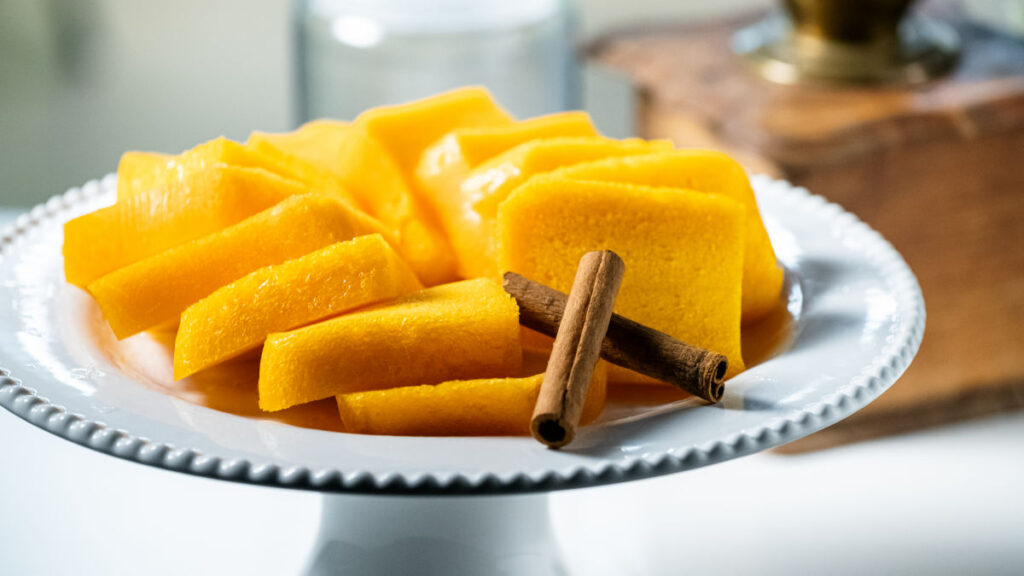 Fatias de Tomar, Tomar's signature local deicacy, presented on a plate with. two cinnamon sticks
