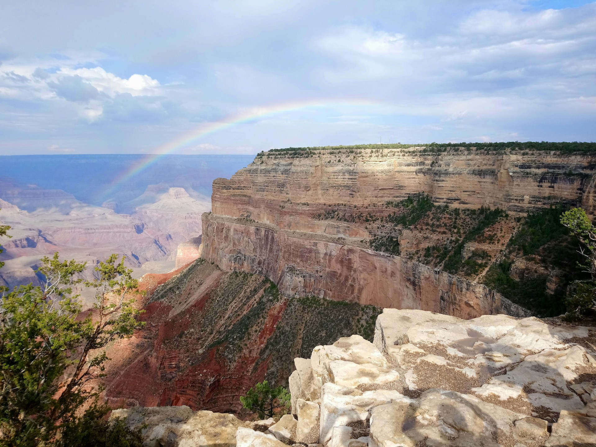 View of the Grand Canyon with a rainbow