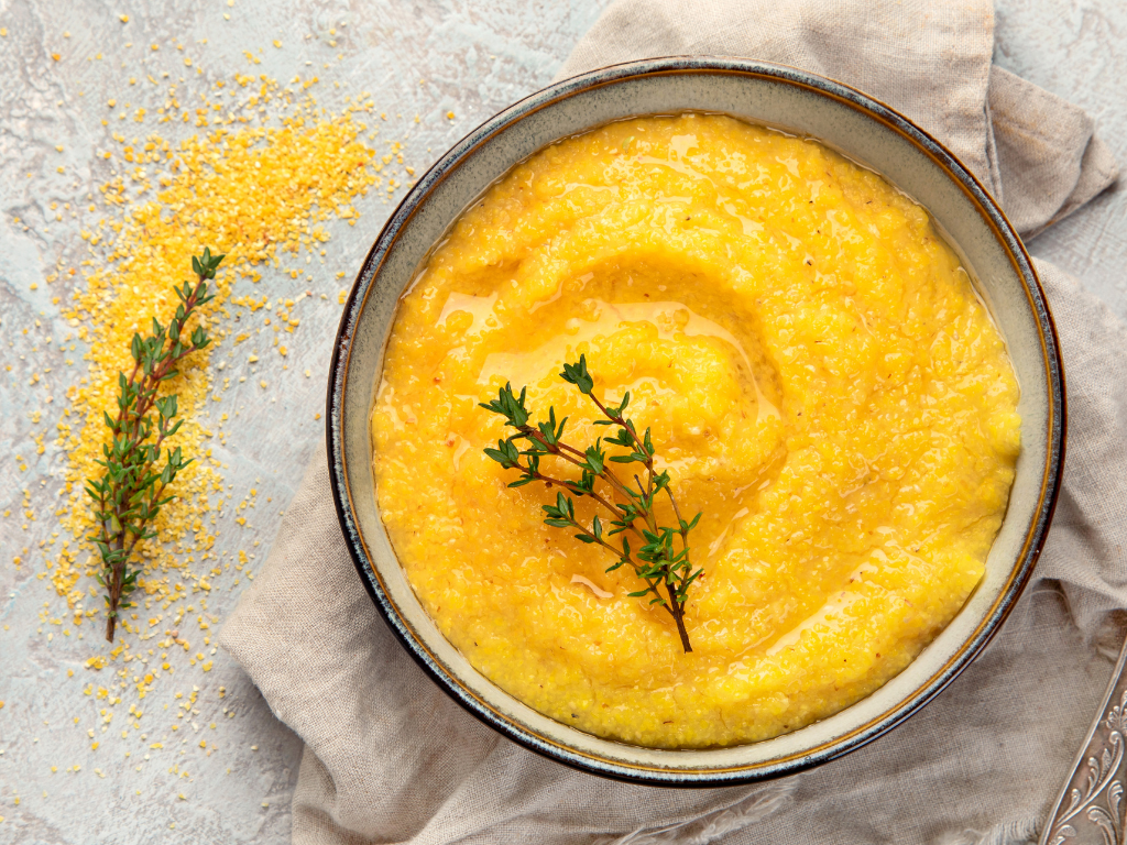 Layout-10-Image-1 a close up shot of a brown bear’s face, with shaggy brown fur