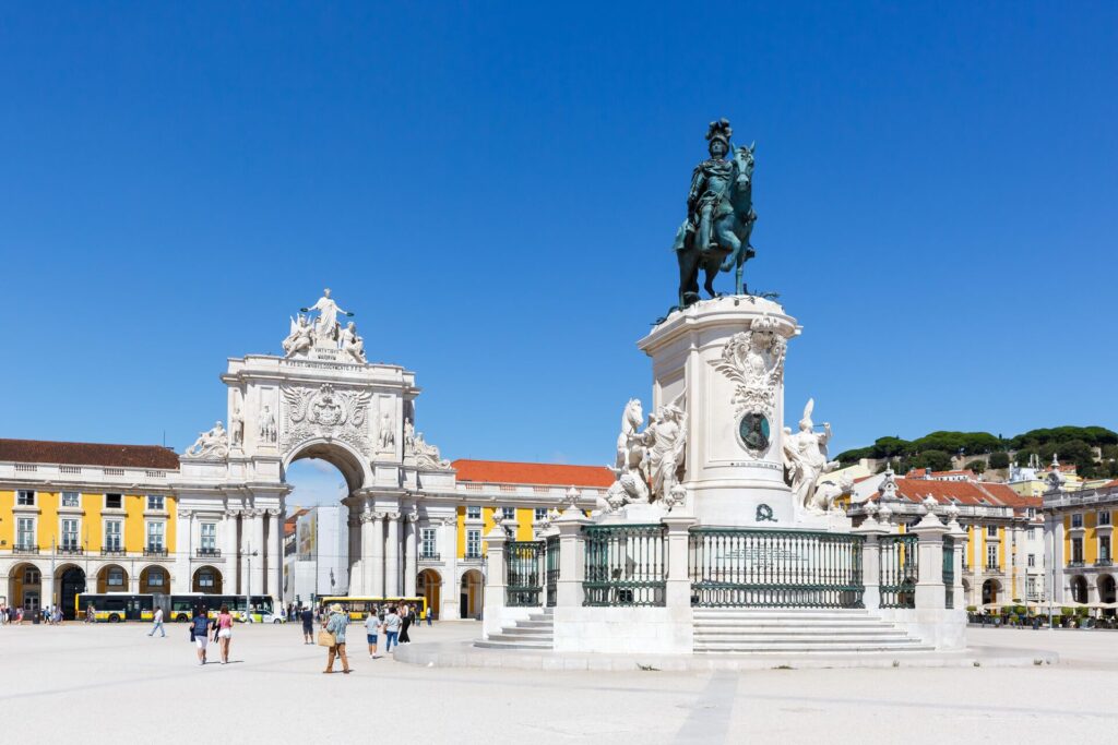 Ornate gates and a statue in Lisbon, Portugal
