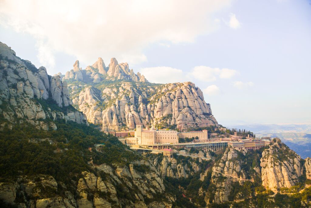 The-monastery-of-Montserrat-between-the-stunning-rock-formations-mountain-in-Catalonia