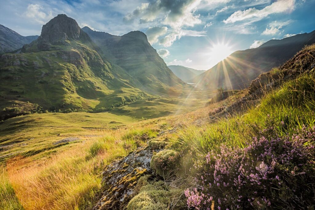 Sun shines on the valley of Glencoe, Scotland