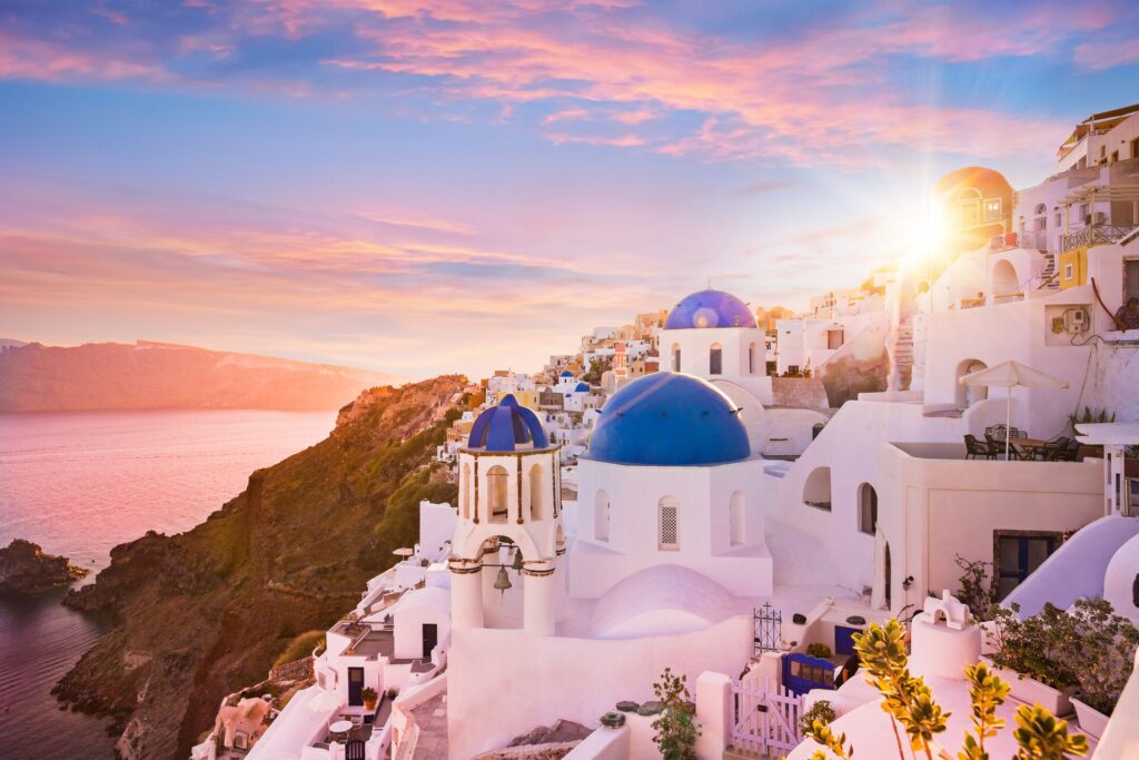 White houses with blue roofs in Santorini, Greece