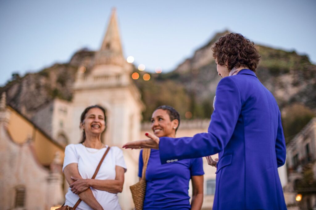 Local expert with guests at sunrise in Taormina