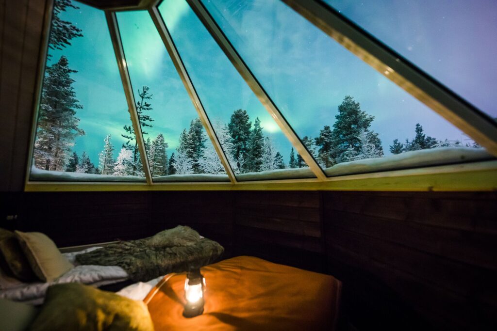 The Northern Lights dance above your head at the Aurora Village Hotel, Finland