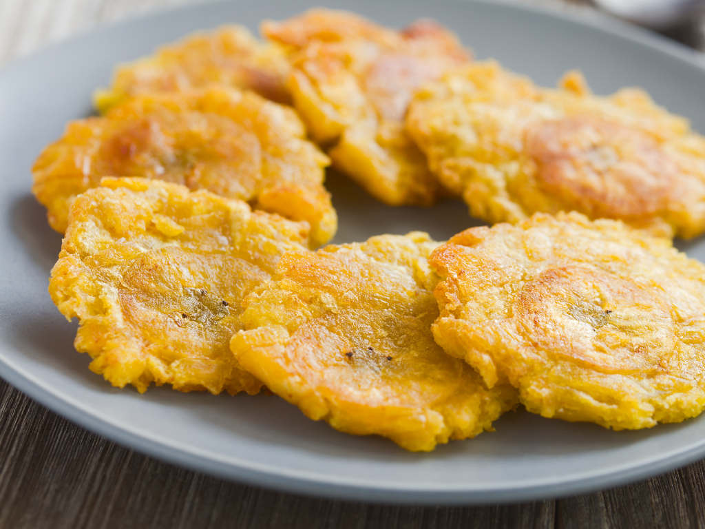a close up shot of a brown bear’s face, with shaggy brown fur