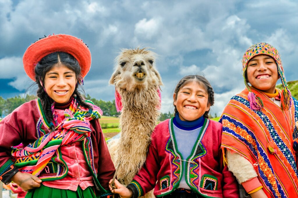 Quechua people of Peru with an alpaca