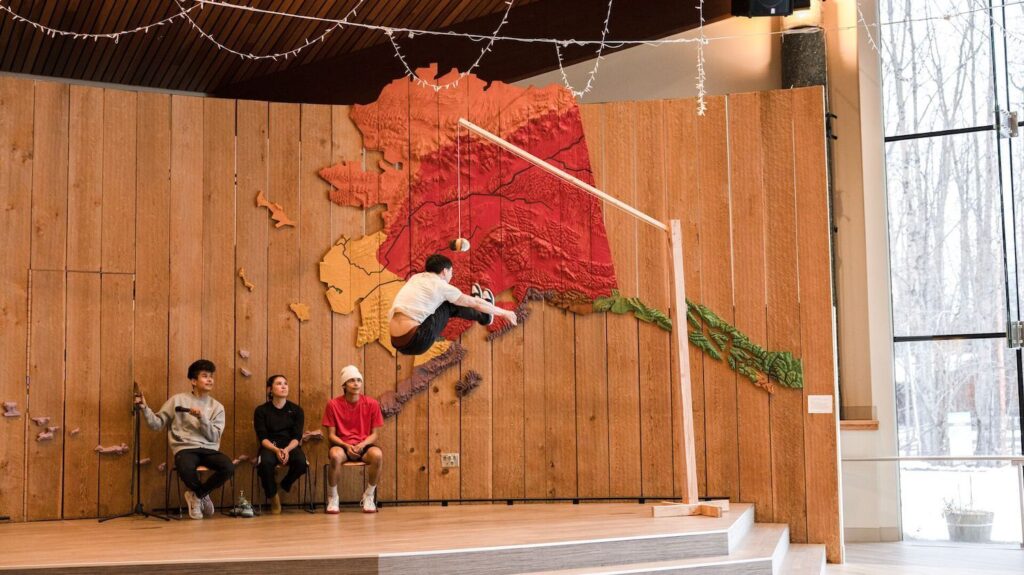 boy doing athletics at the alaska native heritage center
