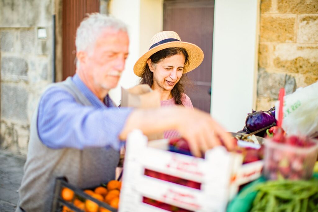 woman at fruit market in italy