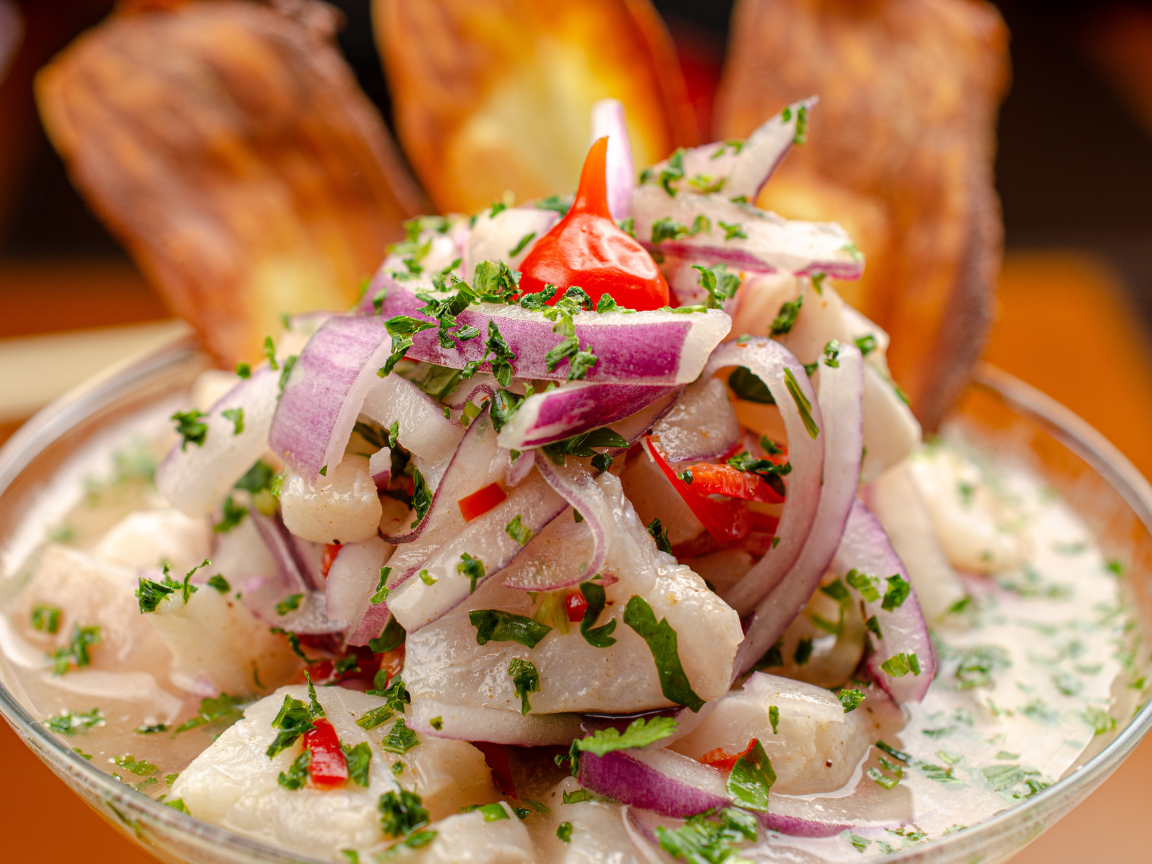 a close up shot of a brown bear’s face, with shaggy brown fur