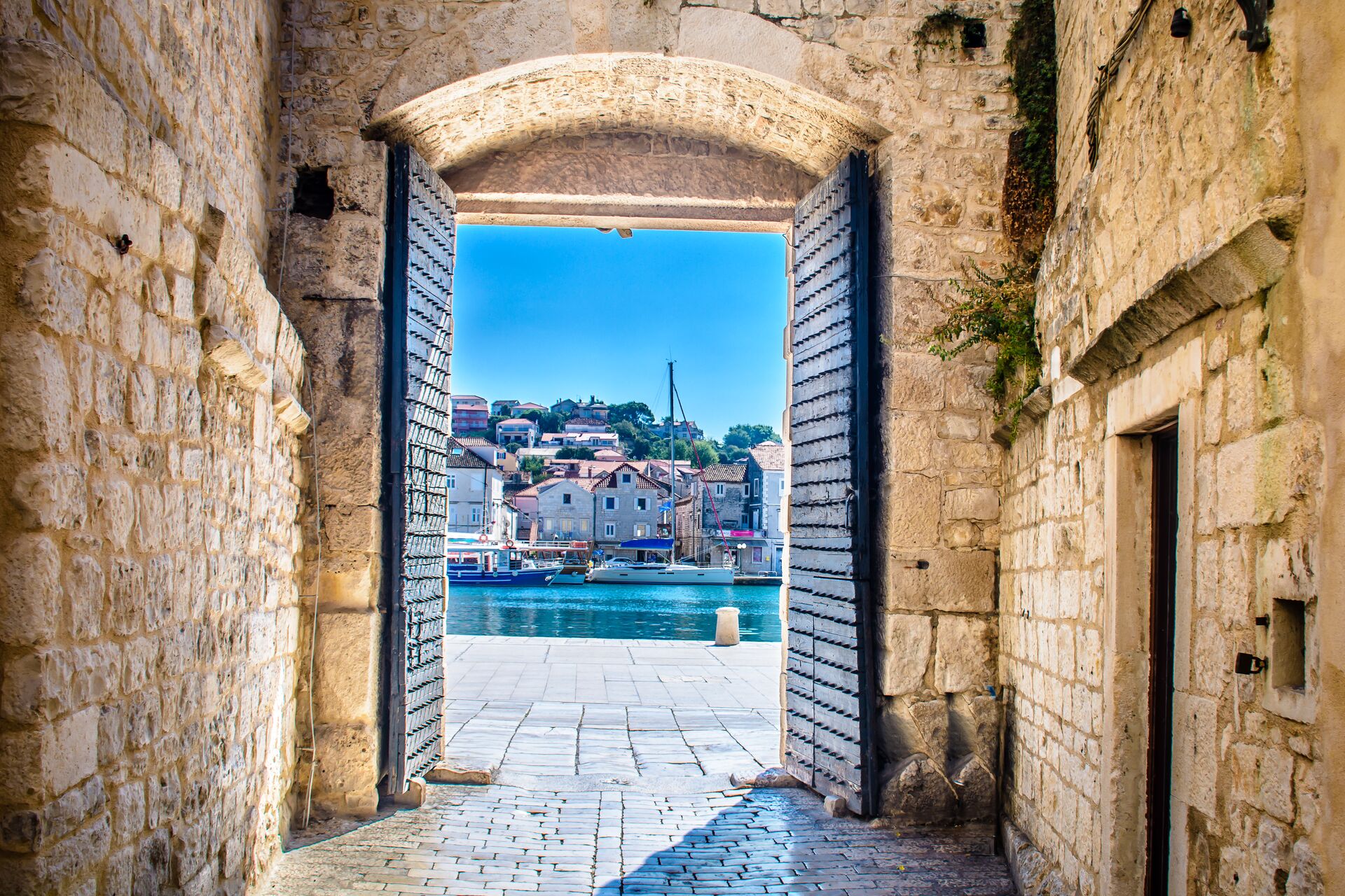An open city gate overlooking the bay in Trogir, Croatia