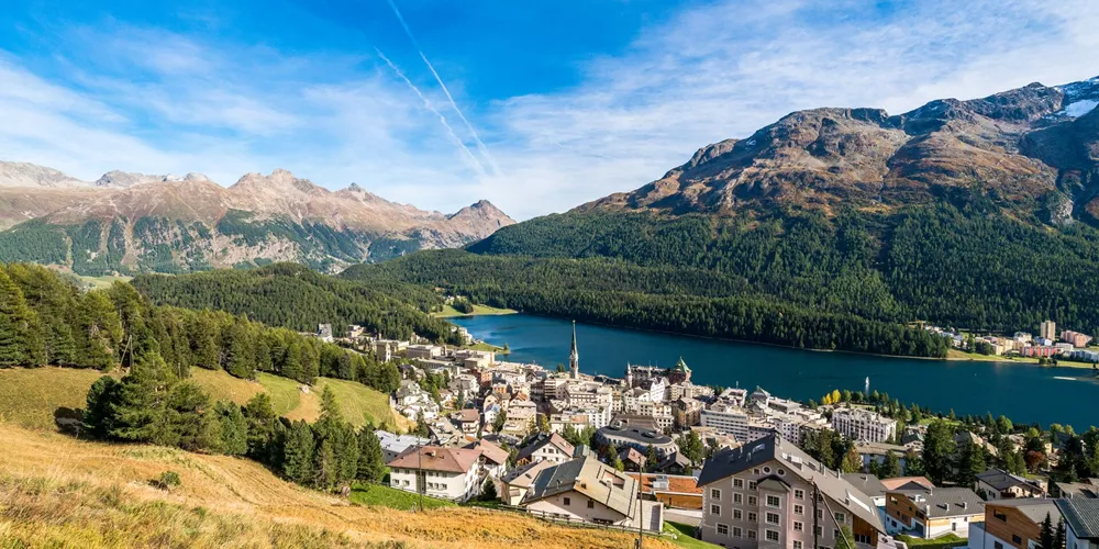 St Moritz village and lake in summer, Switzerland on a sunny day