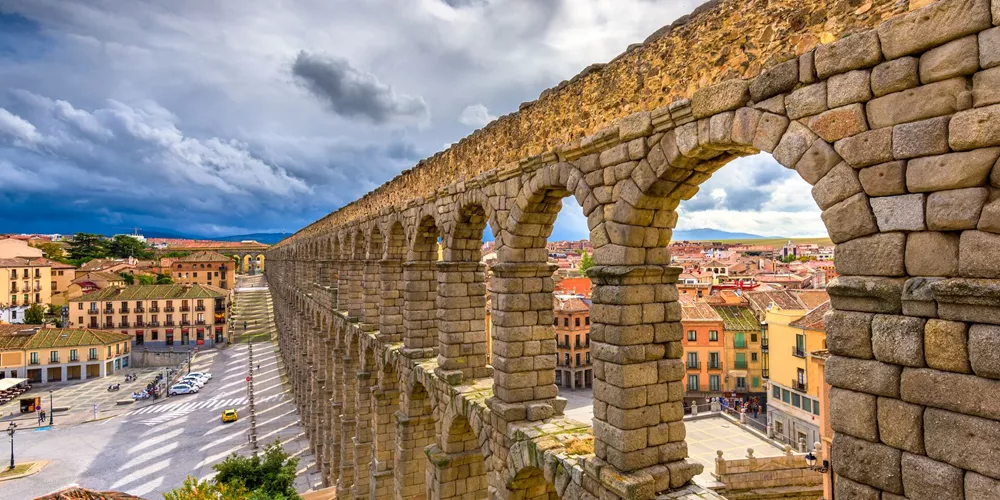 Large Segovia Spain At The Ancient Roman Aqueduct 1133680014