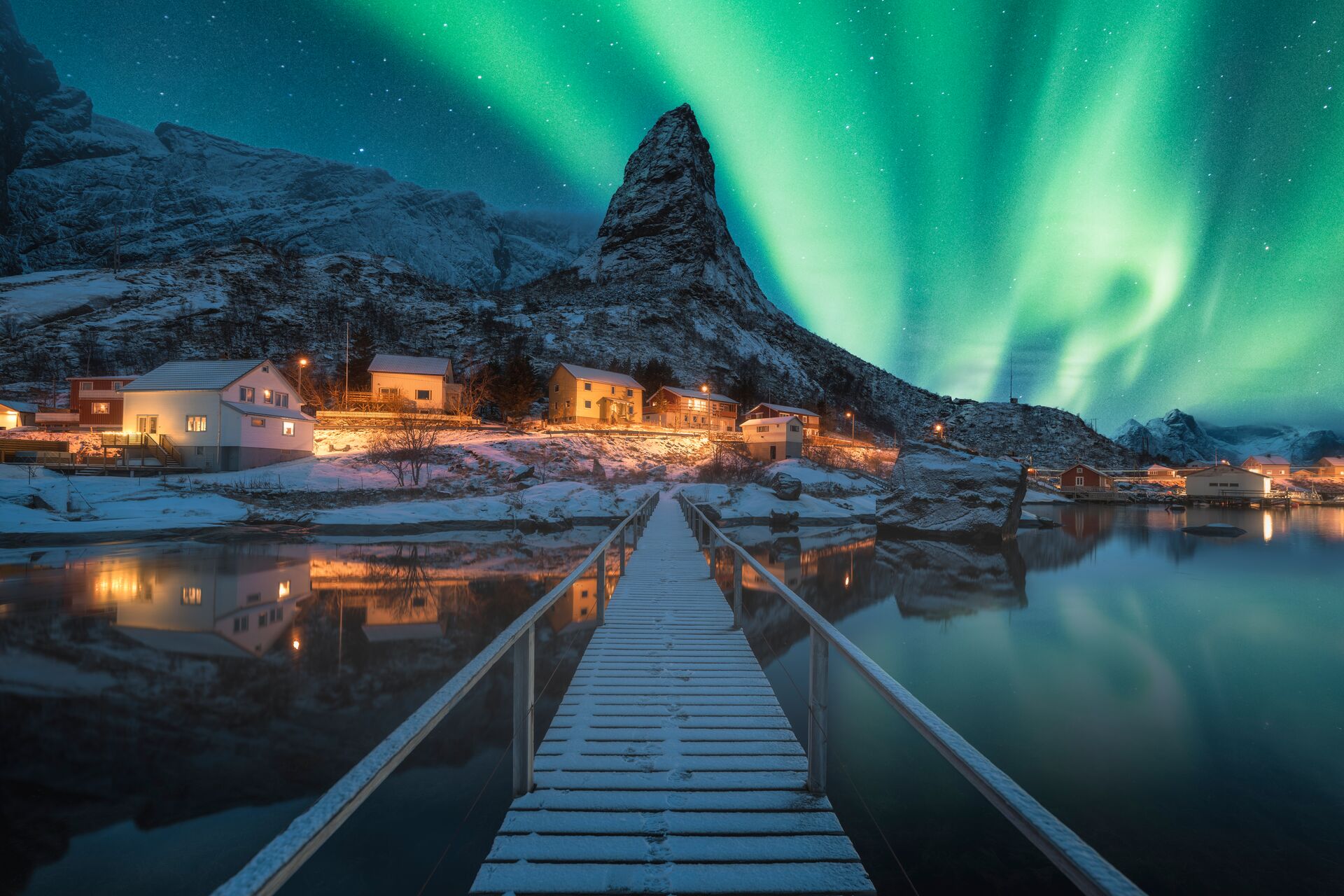 The Northern Lights over Reine in Lofoten Islands, Norway during winter