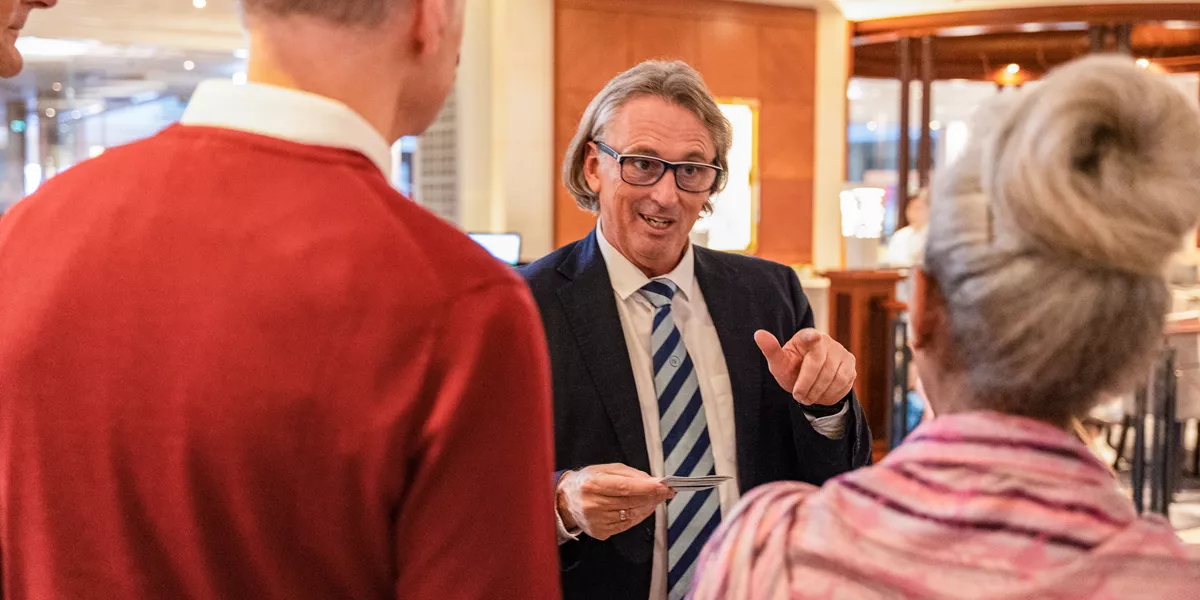 Guest Checking In With Travel Director