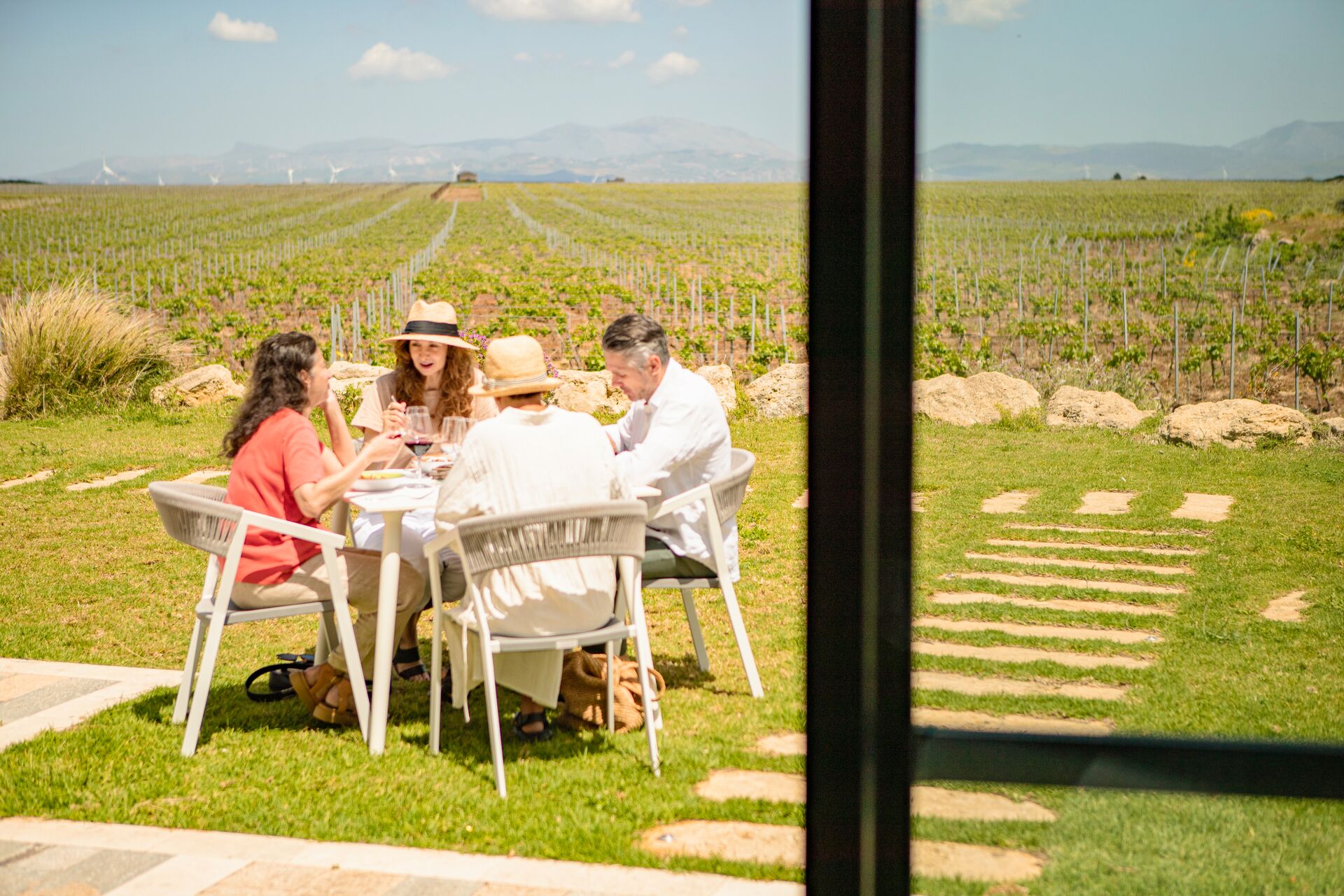 Group of 4 guests wine tasting in Sicily