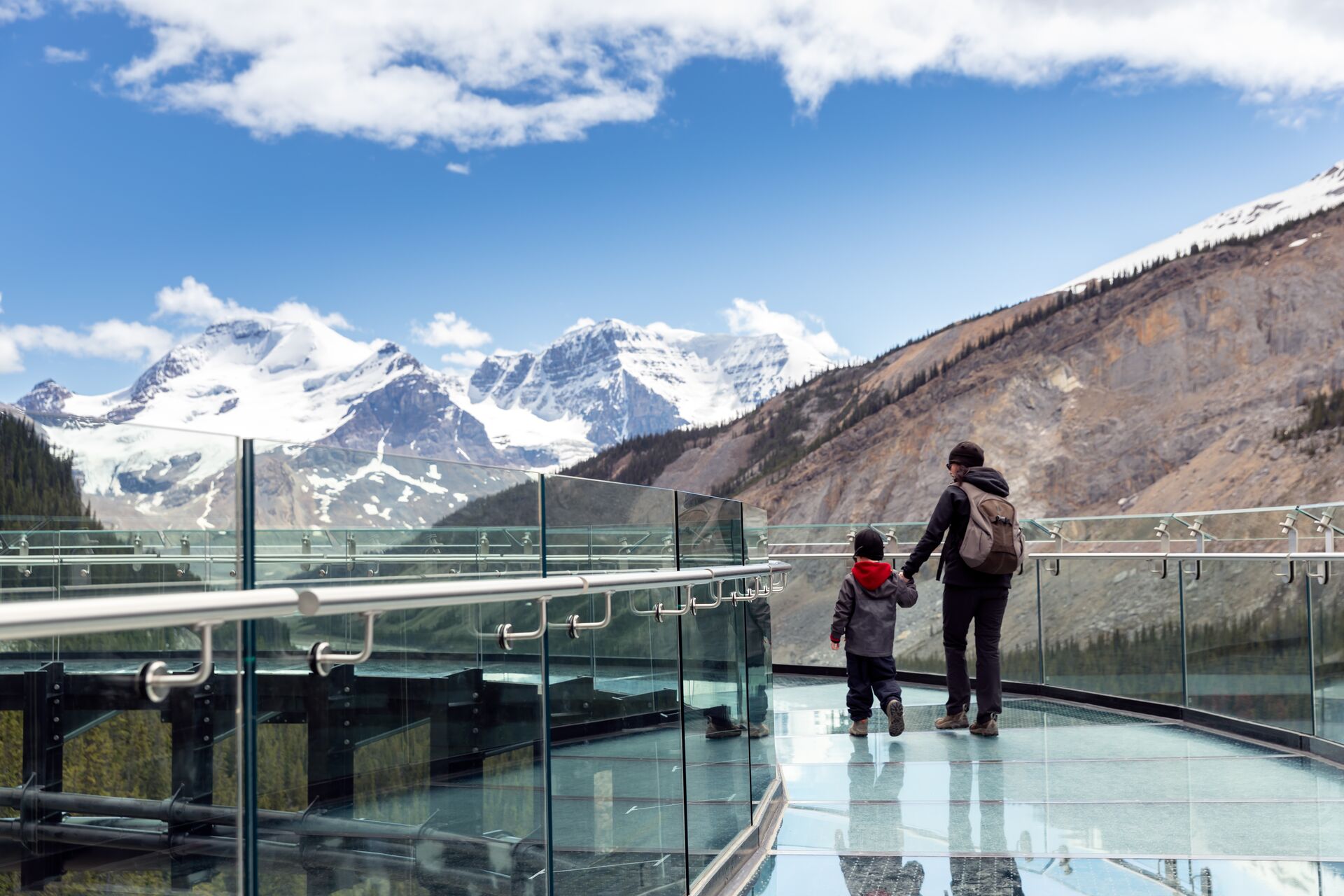 Large Mother And Son Waking On Columbia Icefield Skywalk During Summer In Jasper National Park 1294349547