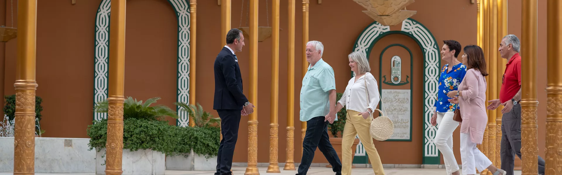 People sightseeing a palace