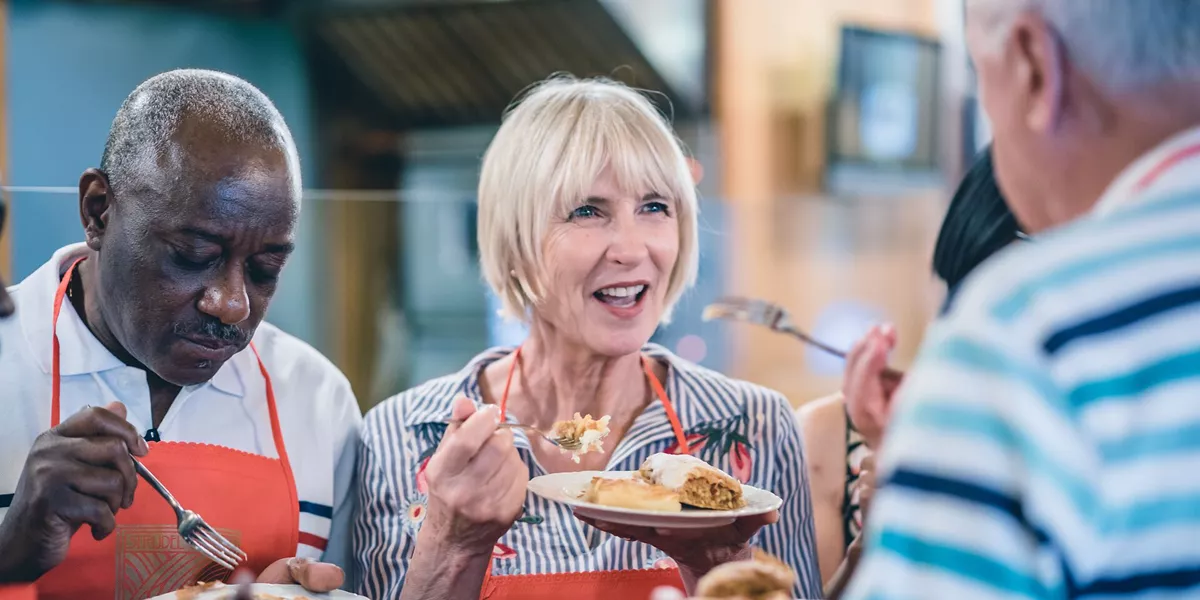 A couple tasting strudel in a Strudel House in Budapest, Hungary