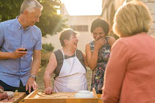 Tourists making pasta in Italy