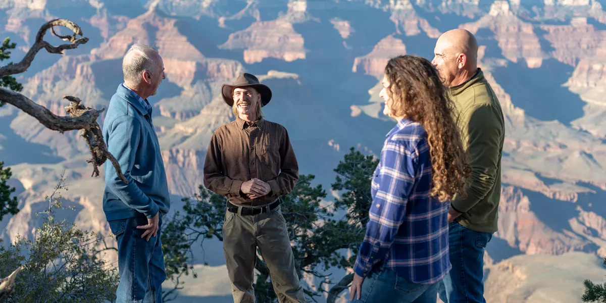 Tourists Talking in the Mountains