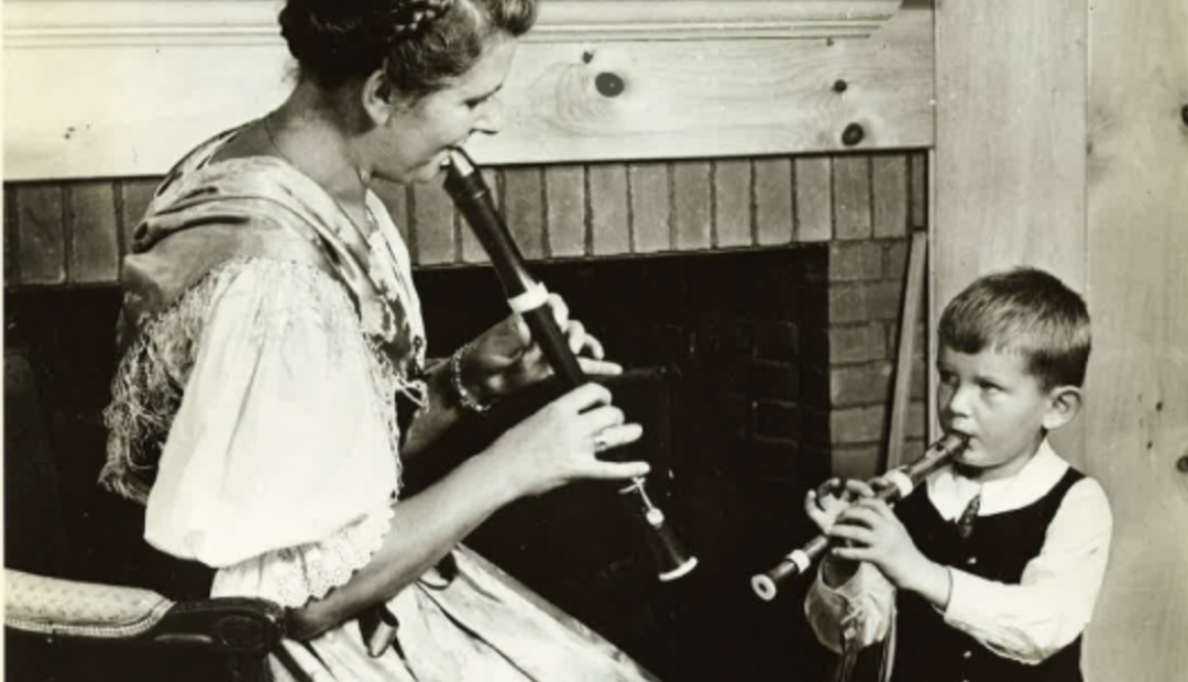 B&W photo, playing instruments