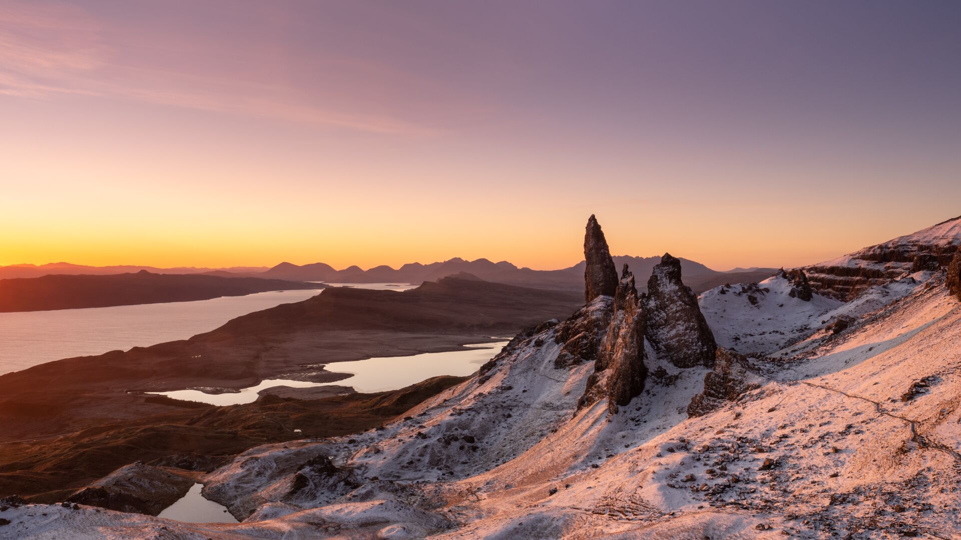 Snow-capped mountains on the Isle of Skye in Scotland, UK