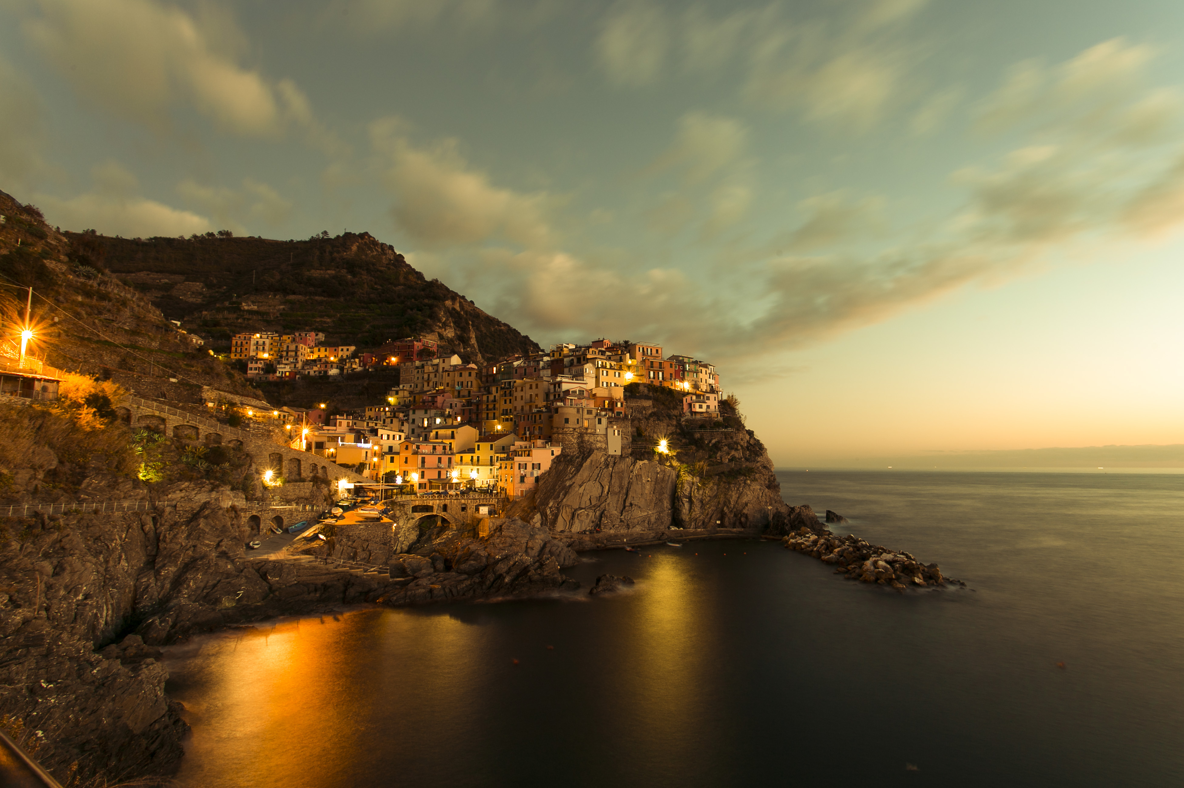 Golden hills with a seaside town