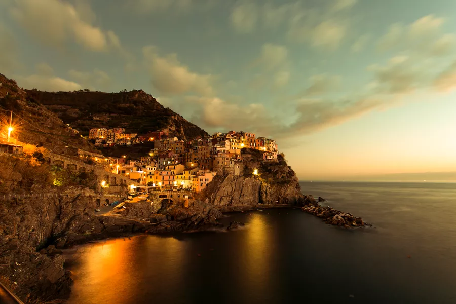 Golden hills with a seaside town