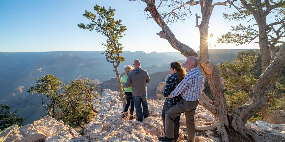 Guest watching the sunrise over the Grand Canyon in Arizona, USA