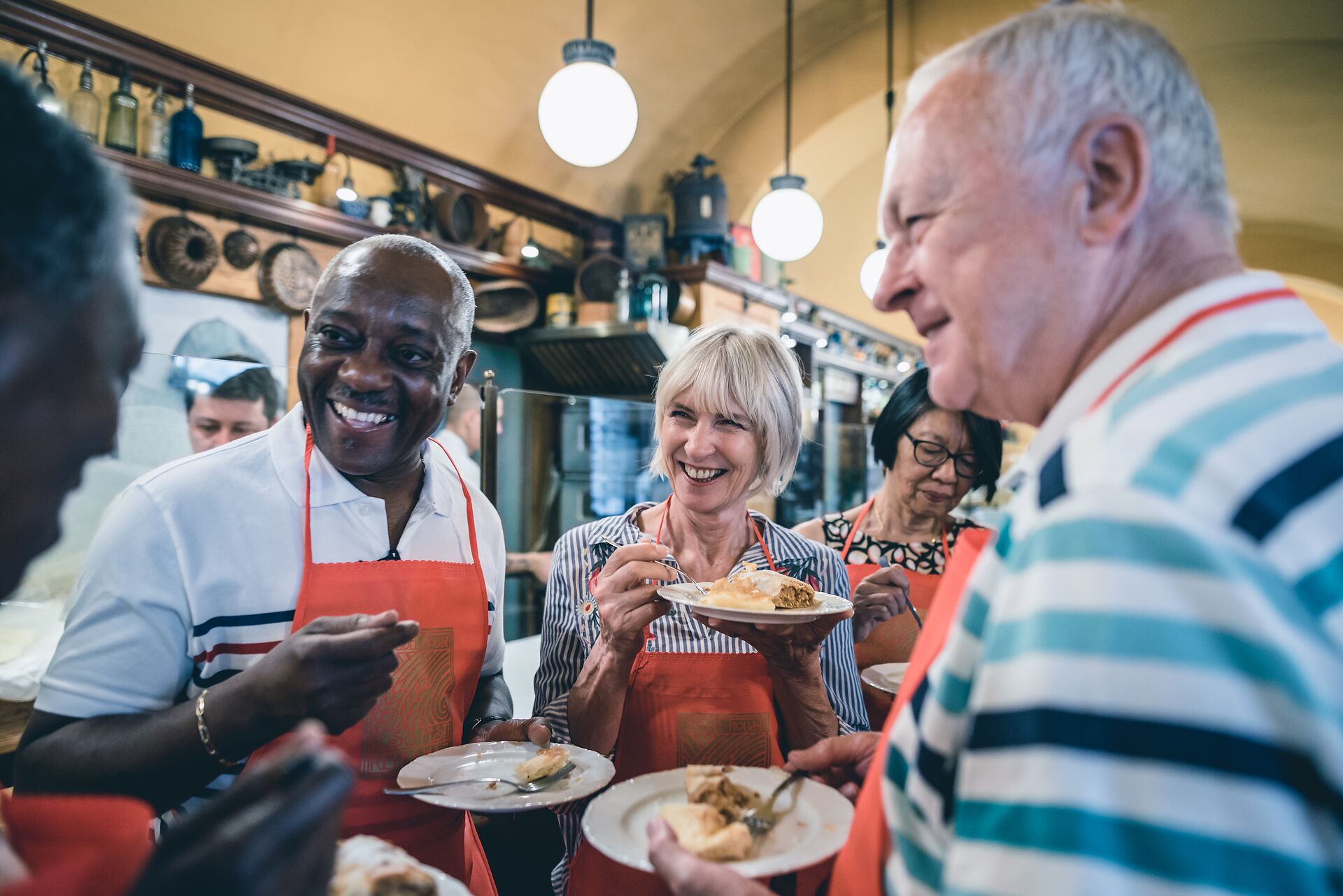 Tourists enjoying a strudel demonstration in Budapest, Hungary 