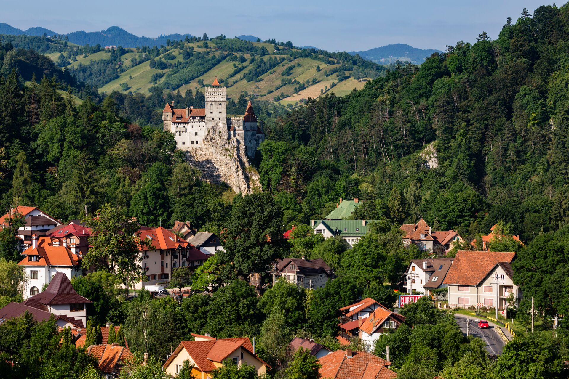 Houses and castle in valley, Bran, Transylvania, Romania