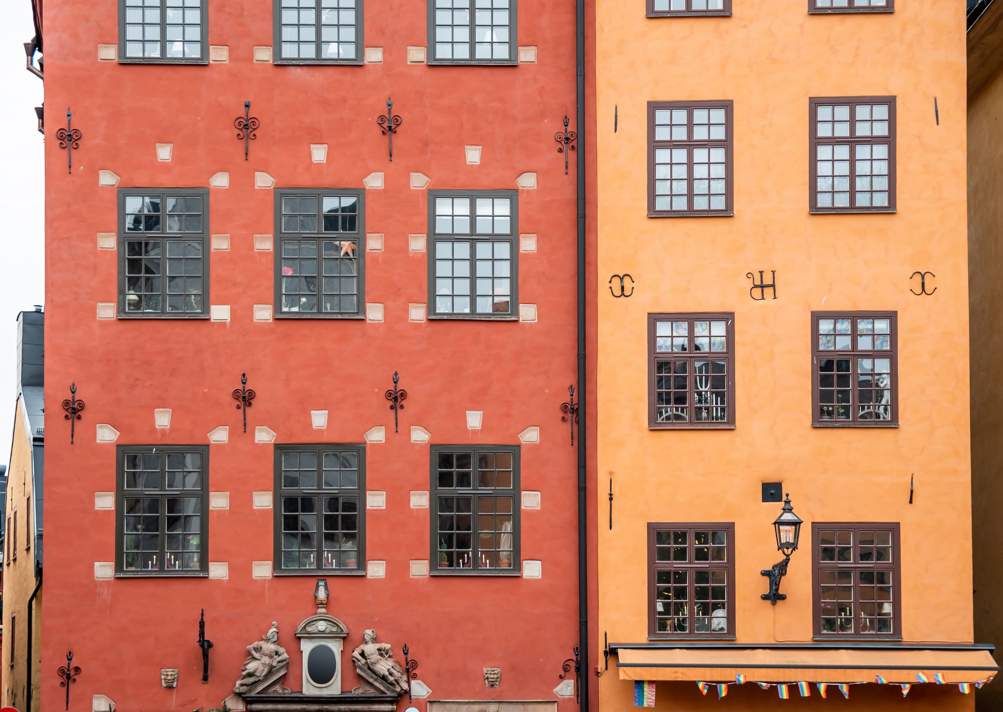 A close up of the colourful facades of Gamla Stan in Stockholm, Sweden