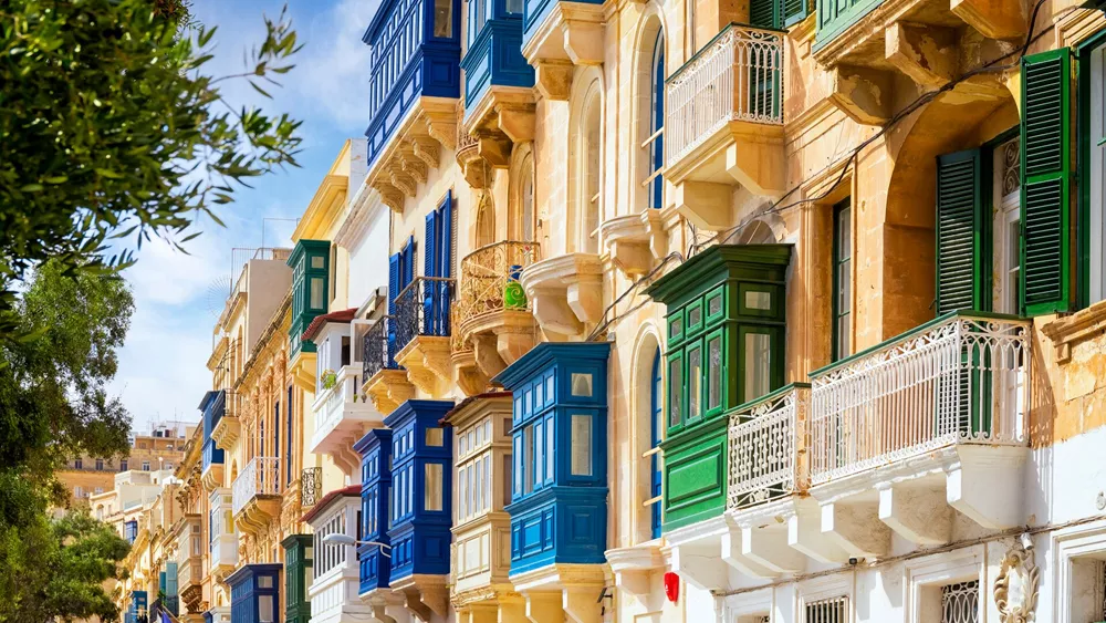 Traditional Closed Wooden Balconies On The Streets Of Valletta, Malta, Europe