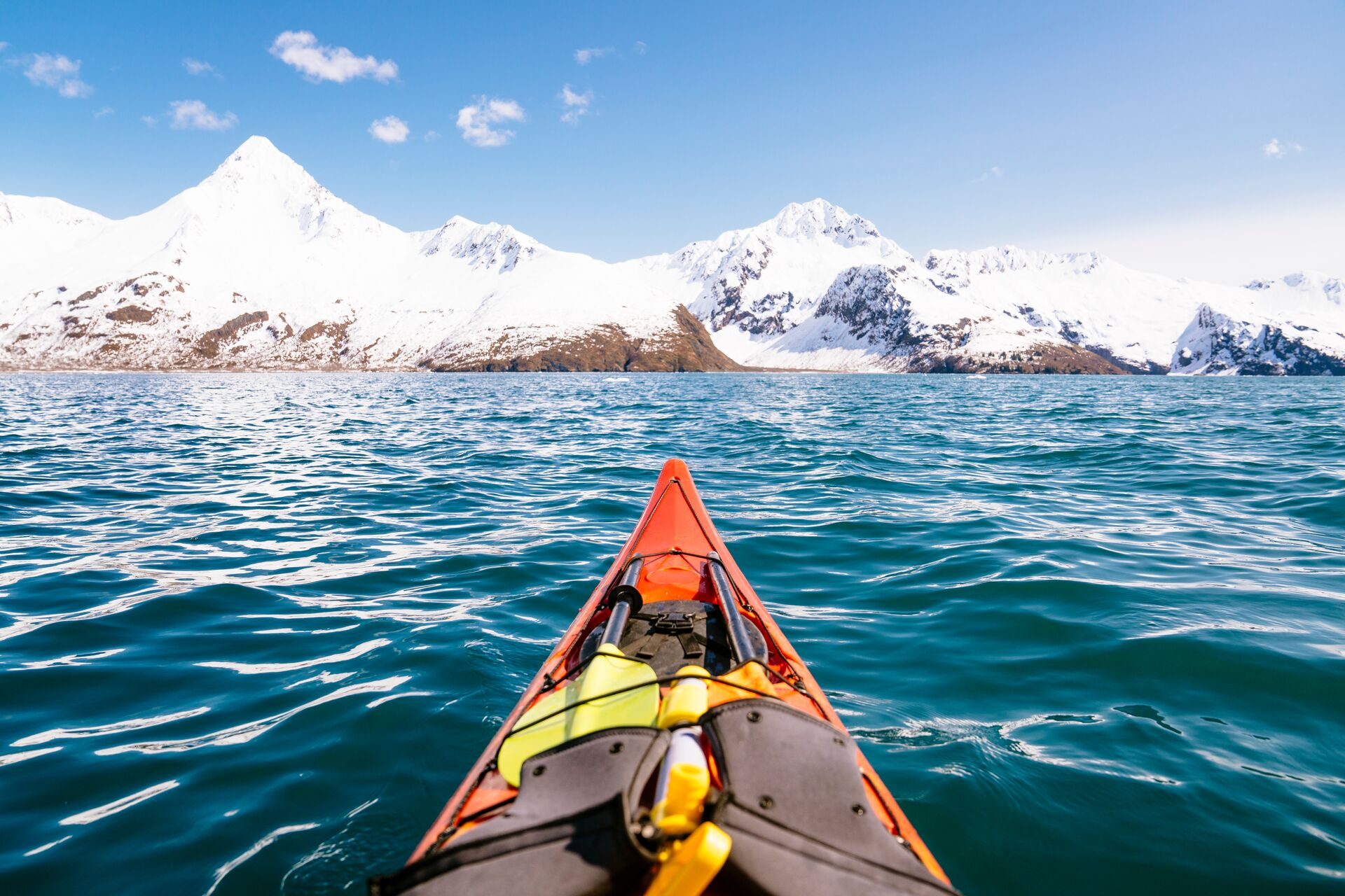 Person kayaking in Kenai Fjords National Park, Alaska