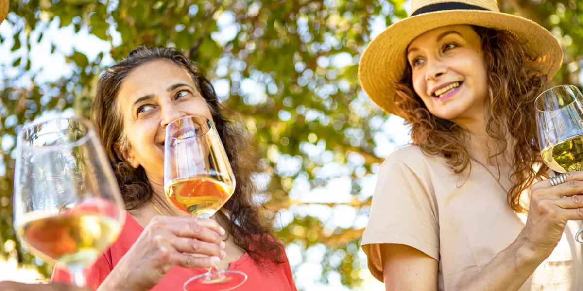 Guests enjoying wine tasting at Baglio Donna Franca wine resort in Marsala, Sicily, Italy