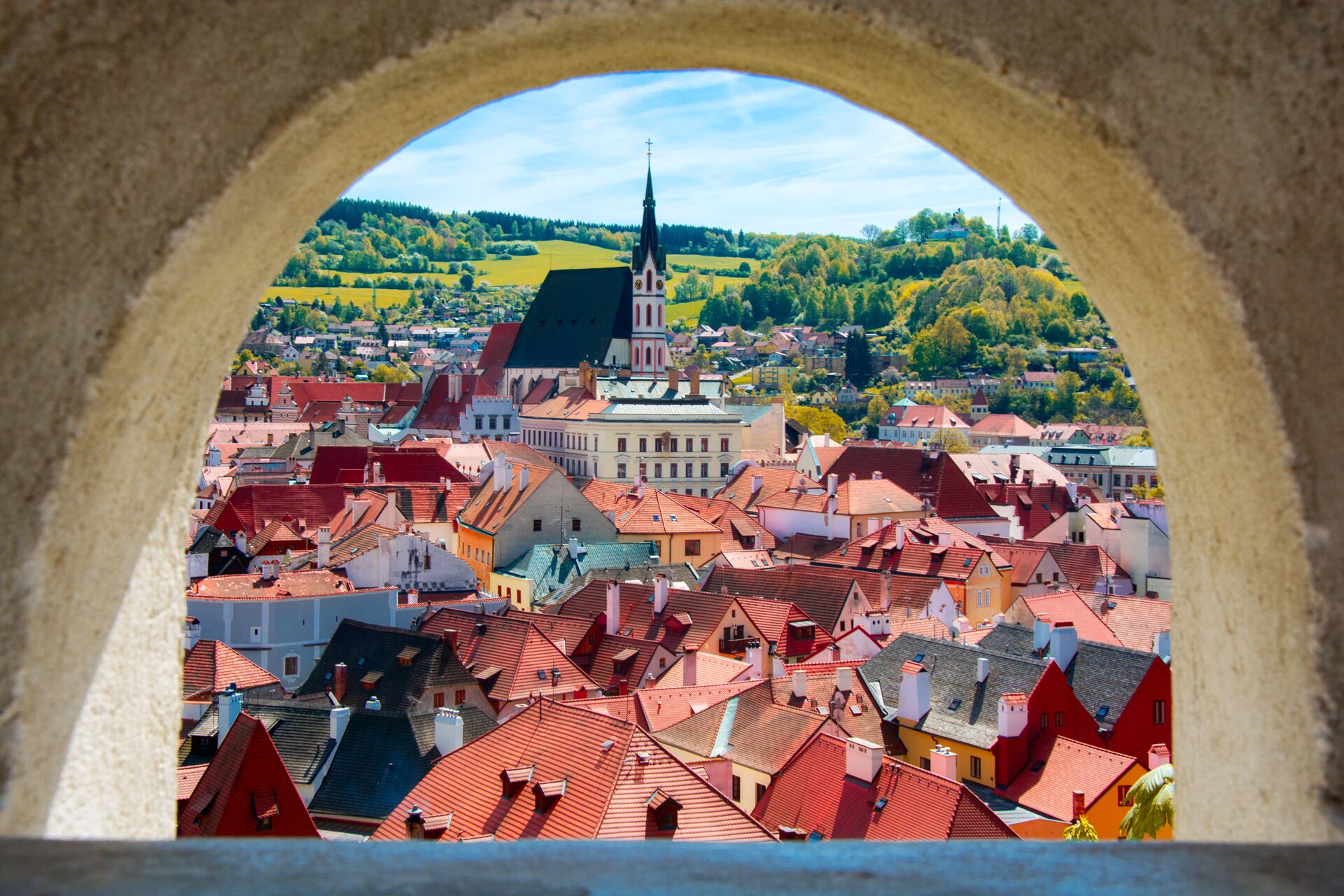UNESCO Heritage Site Cesky Krumlov in Czech Republic seen through an arch