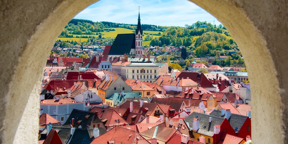 UNESCO Heritage Site Cesky Krumlov in Czech Republic seen through an arch