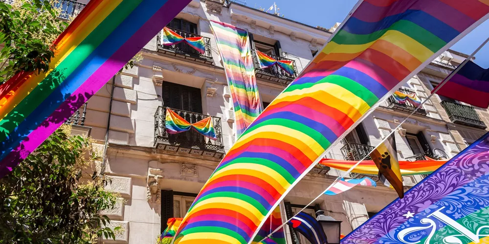 Chueca Neighborhood in Madrid Spain decorated with pride flags