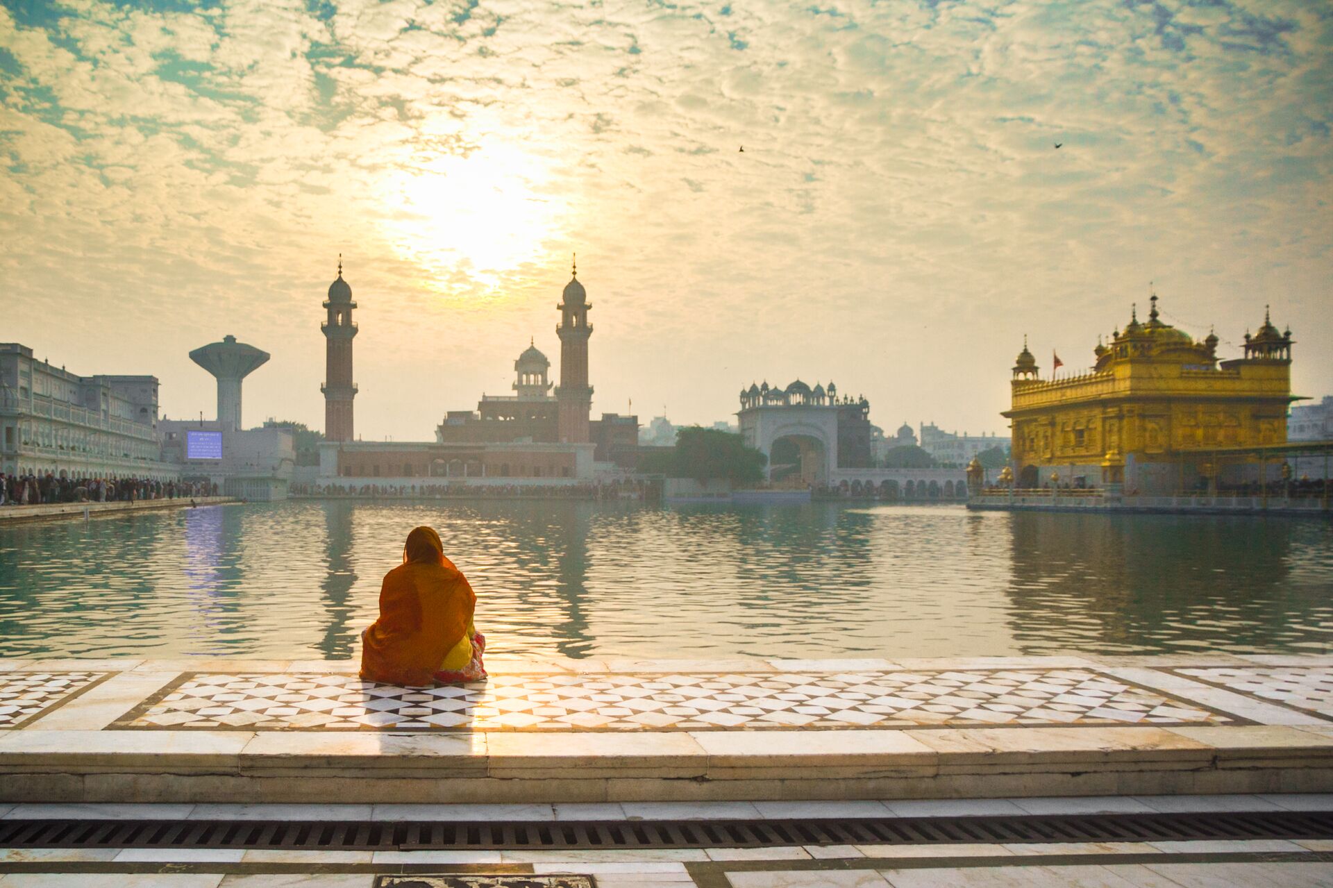 Woman Praying At Golden Temple, India