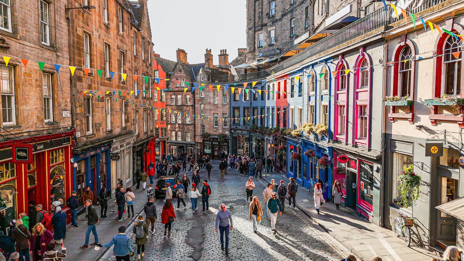 People shopping on Victoria Street in Edinburgh, Scotland