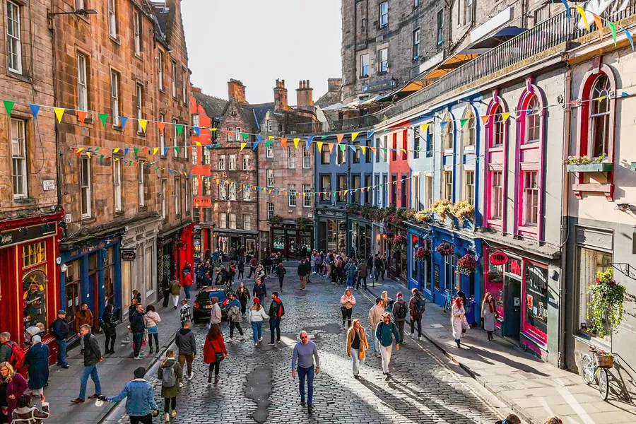 People shopping on Victoria Street in Edinburgh, Scotland