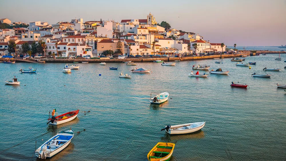 Ferragudo medina at dusk in Algarve, Portugal