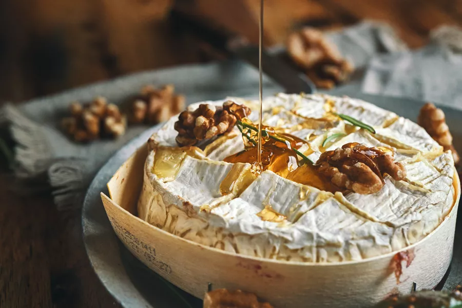 Baked Camembert Cheese Served With Honey And Fresh Figs 1350904124