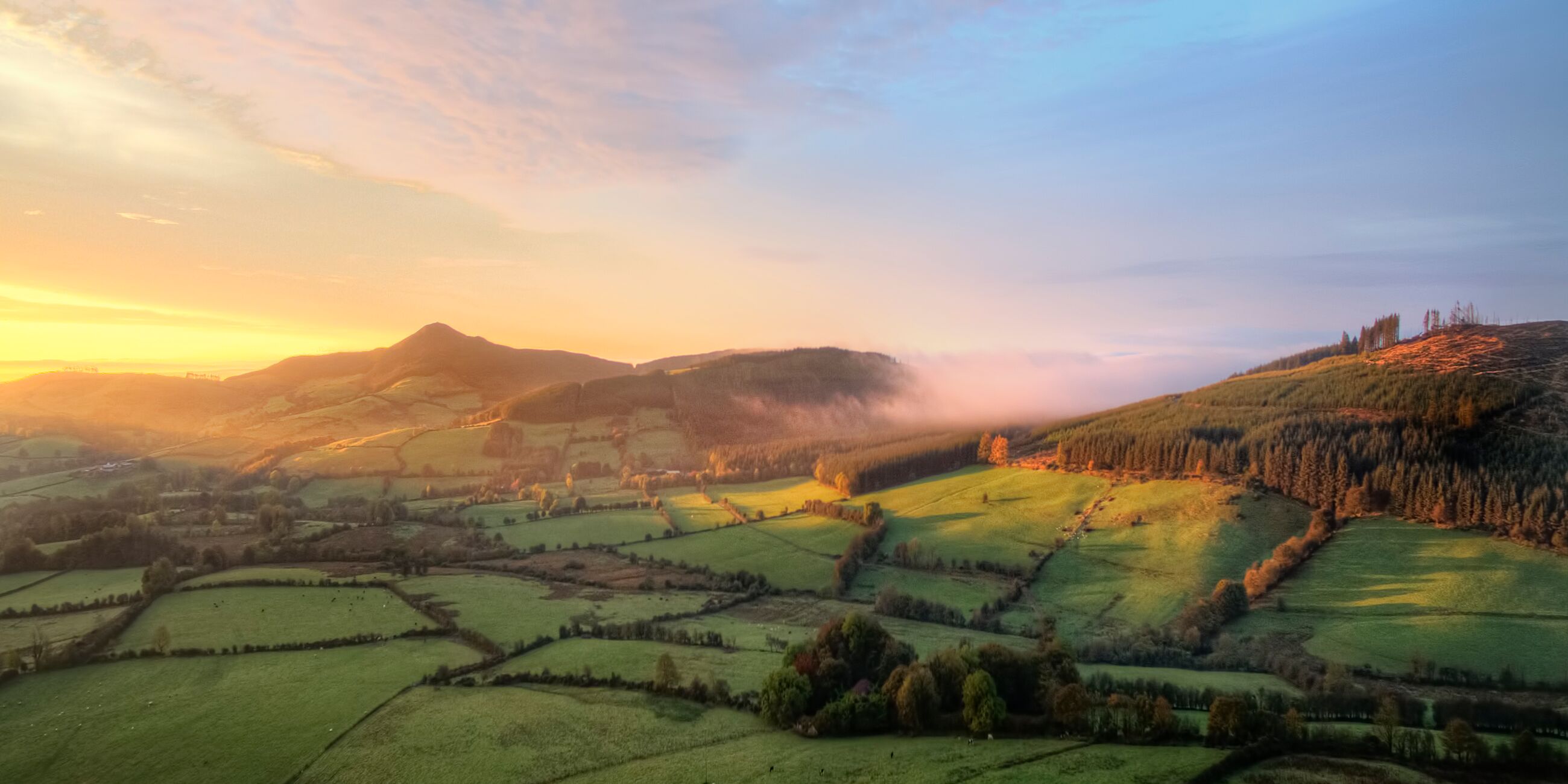 Foggy sunrise over Tipperary Mountains in Ireland